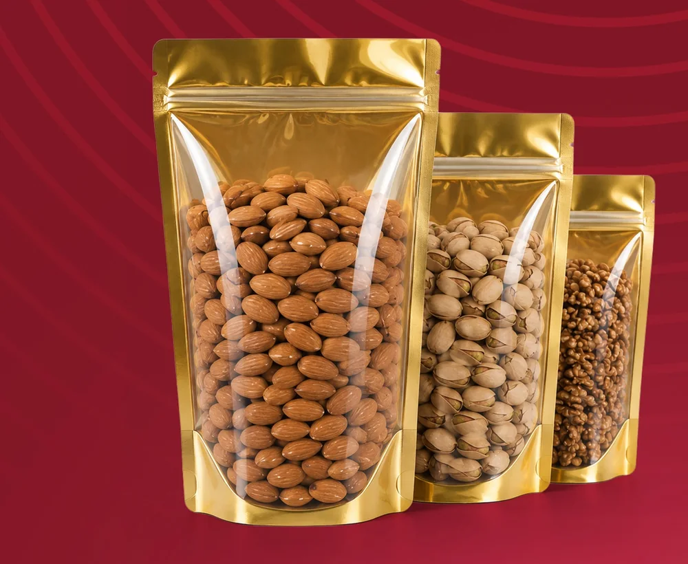Gold Şeffaf Metalize Doypack — Altın rengi metalize gövde, geniş şeffaf pencere ve kilitli ağız.